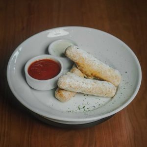 3 giant hand-breaded mozzarella cheese sticks. Served with fresh tomato sauce and creamy ranch